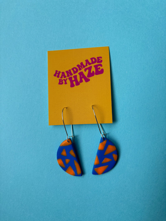 Half moon dangles: orange triangles