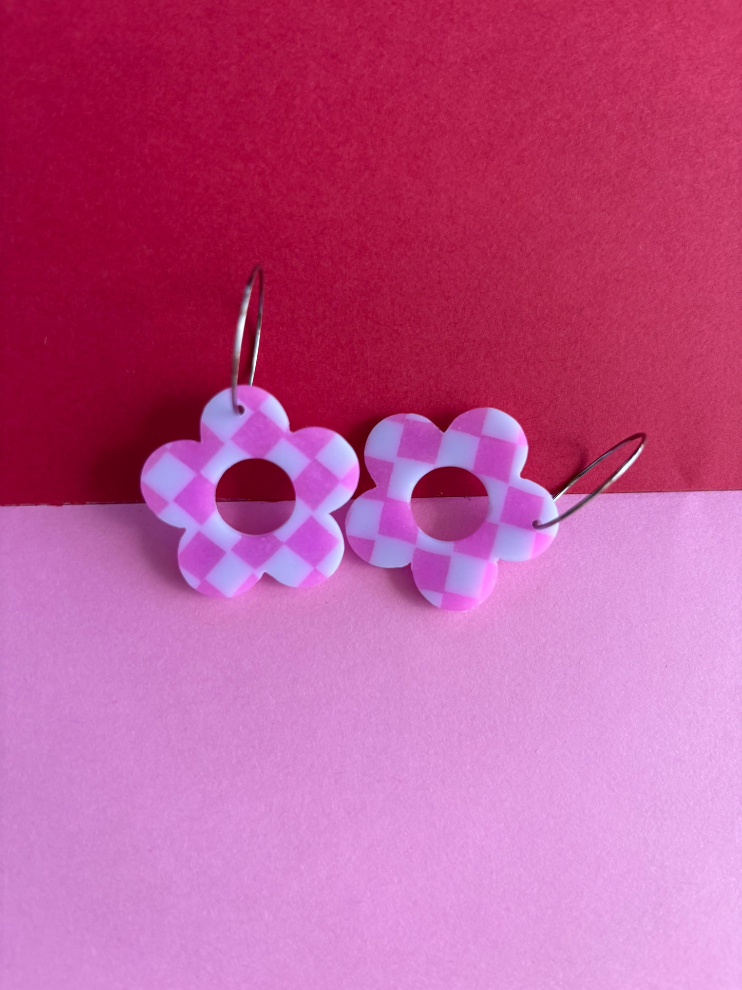 Pink translucent checkered daisies